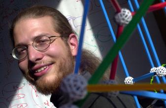 [Headshot of Erik Demaine with Zometool polyhedron in foreground]